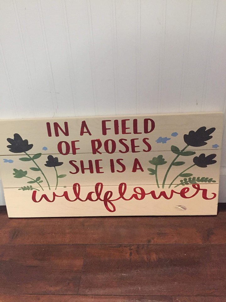 In a field of roses she is a wildflower