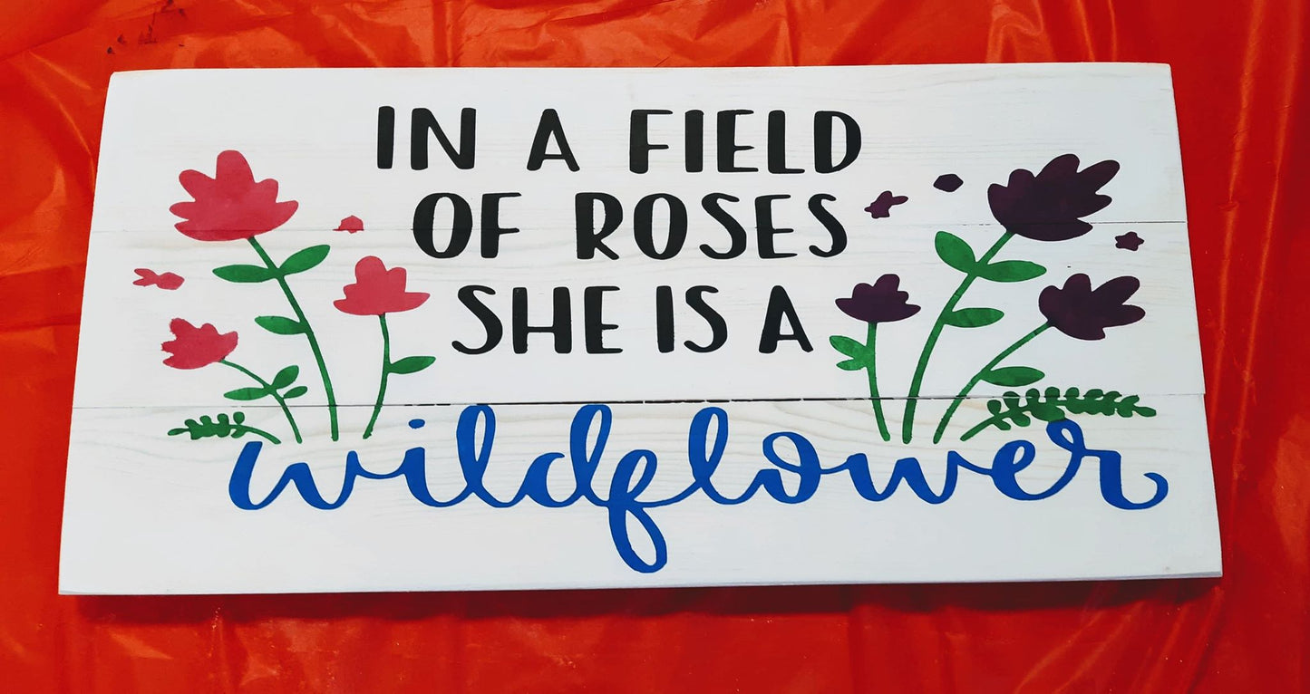 In a field of roses she is a wildflower