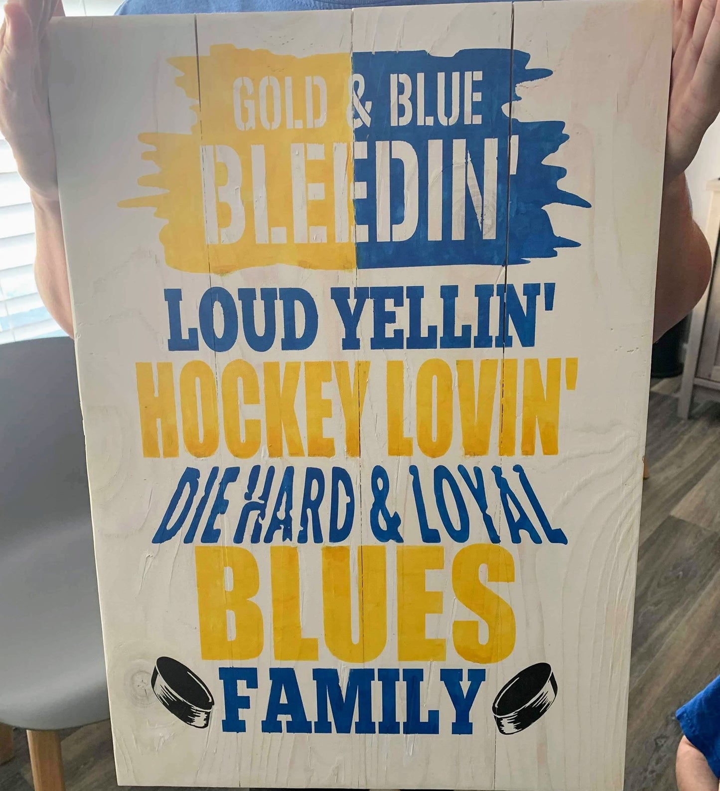 Gold and blue bleedin' loud yellin' hockey lovin' die hard & loyal blues family