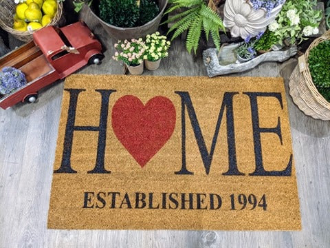 H♥me with established date at the bottom