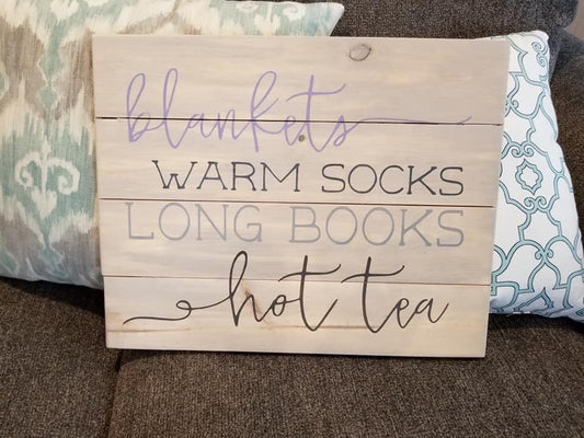 Blankets warm socks long books hot tea